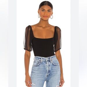 Free people black puff sleeve top